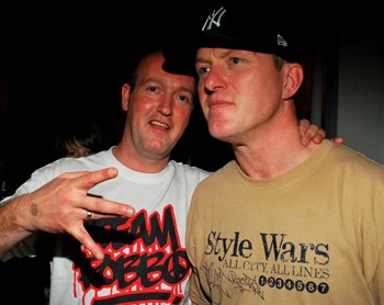 Choci with another artist by the name of Doze, wearing a Team Robbo t shirt